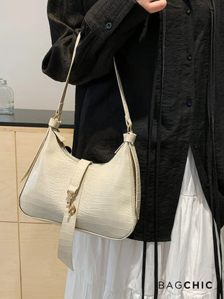 Anna - Modern Leather Chain Accent Saddle Bag